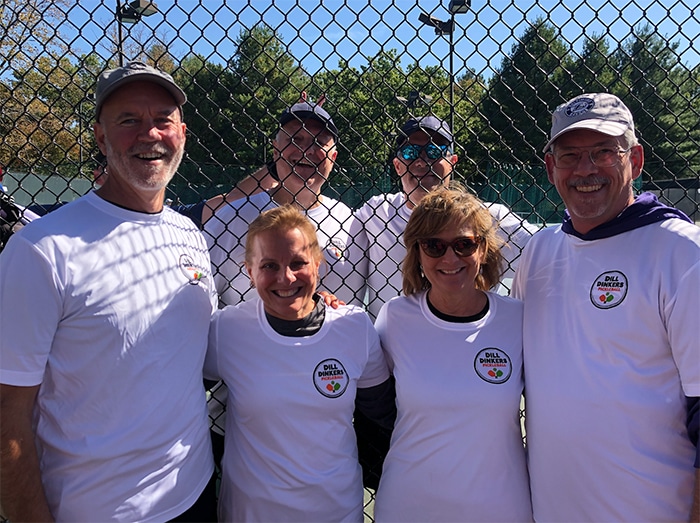 Dill Dinkers franchise community members wearing brand shirts